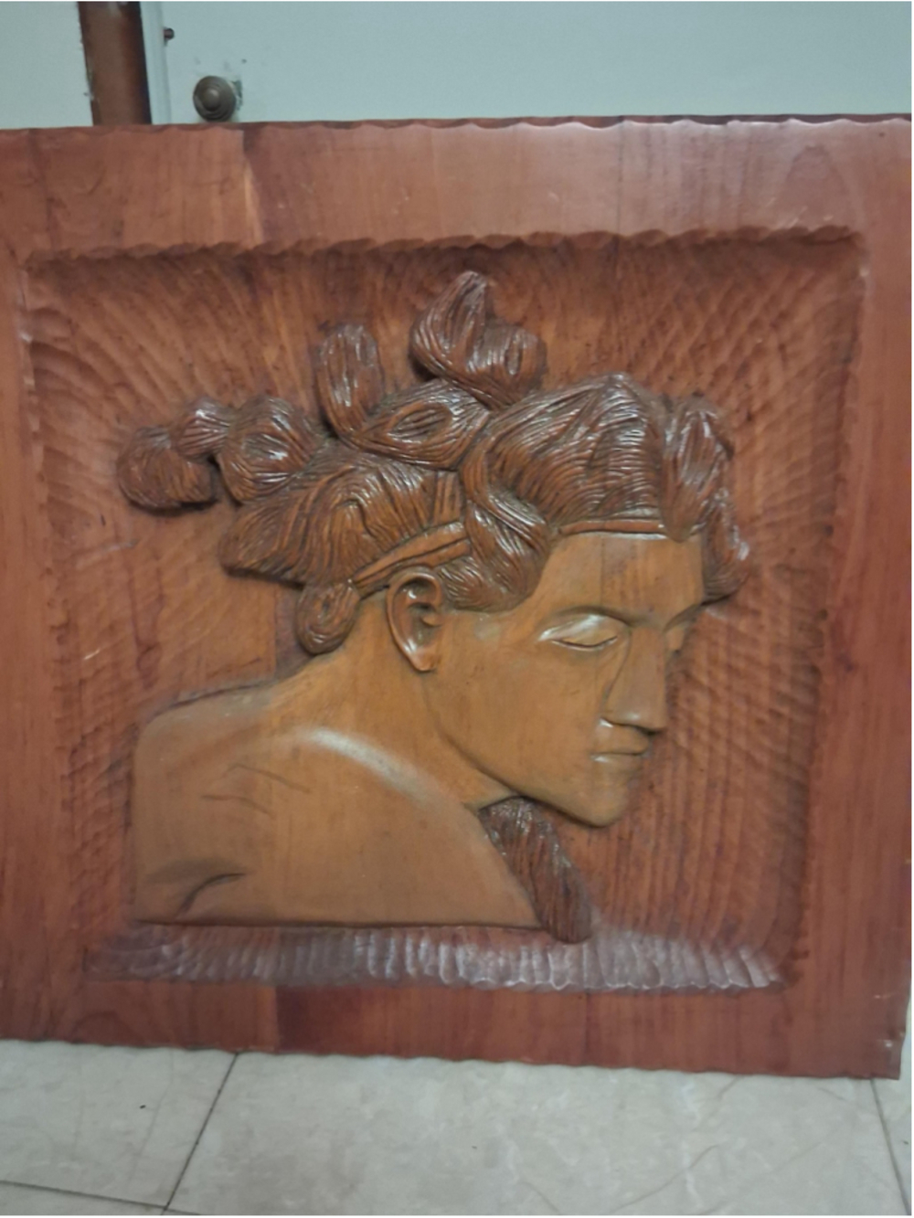 Wood carving of Michelangelo signed